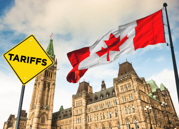 istock Us Tariffs street sign in canada ottawa parliament building 2197352568