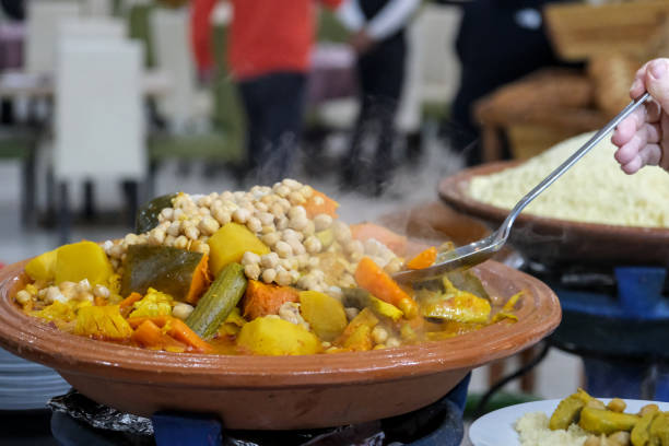 istock A steaming Moroccan tagine filled with chickpeas, vegetables, and rich spices. 2197355996