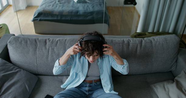 istock A woman with headphones 2197356265