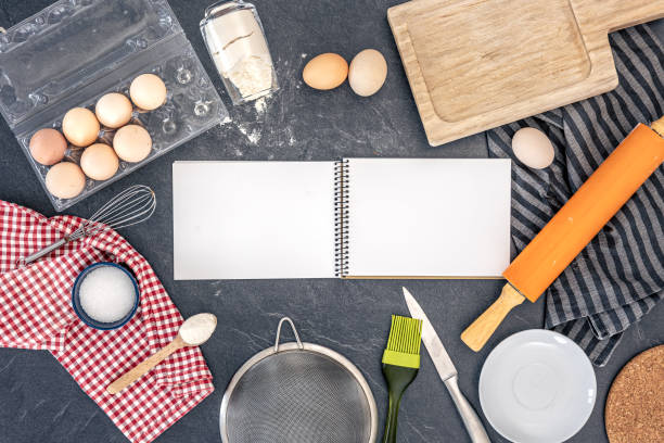 Background with baking ingredients and blank book. Baking ingredients.