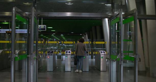 istock A woman enters the subway 2197357309