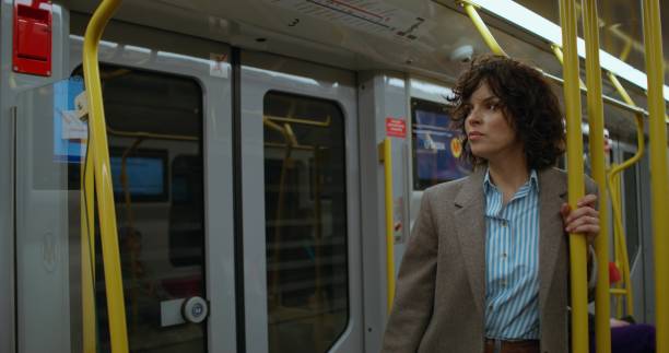 istock A woman rides the subway 2197357353