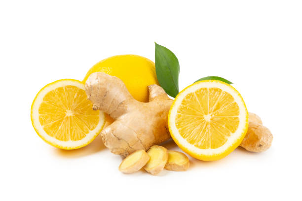 istock Fresh ginger and lemon isolated on white background. Sliced ​​ginger. Ginger root. Traditional alternative medicine, healing tea for immunity. Close-up. 2197360626