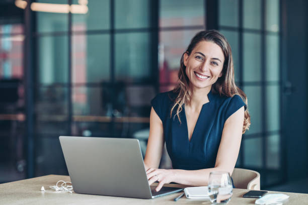 istock Businesswoman using laptop in the office 2197361022
