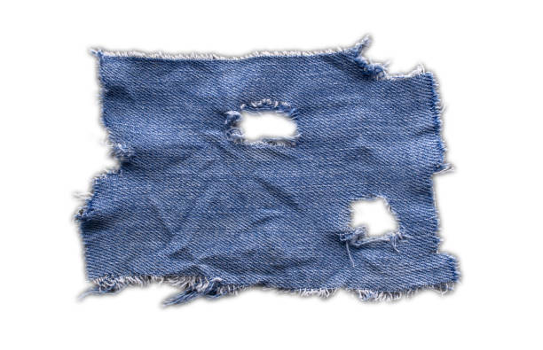 istock jeans. a frayed and torn piece of denim rag 2197362464
