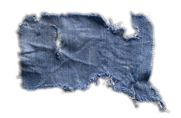 istock jeans. a frayed and torn piece of denim rag 2197362467