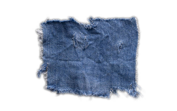 jeans. a frayed and torn piece of denim rag