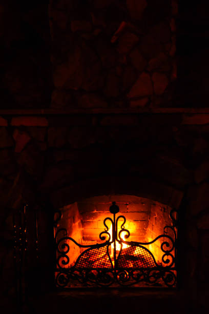 istock Fireplace with beautiful texture for home interior. Fireplace in the house. Burning fireplace. Fire design 2197363210