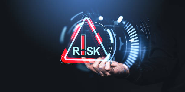istock Man finger touch red risk sign hologram and abstract glowing lines 2197364813