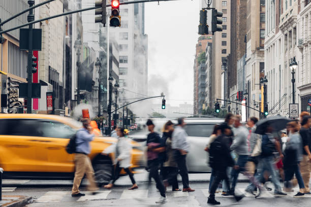 Busy crosswalk and road intersection in New York Manhattan