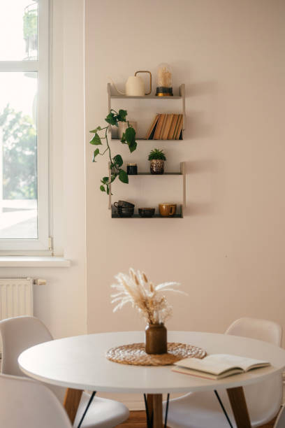 istock Stylish bohemian kitchen with modern decor and cozy dining area 2197377710