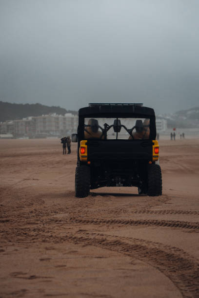 istock ATV quad bike at the beach during storm 2197381506