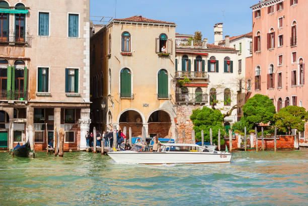 Venice, Italy - April 24, 2019: Venice city life along the famous Grand Canal