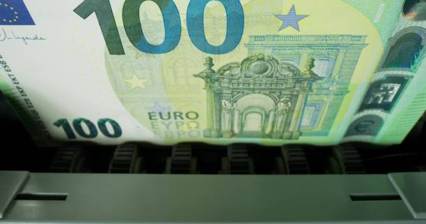 istock The calculating machine counts euro bills 2197385060