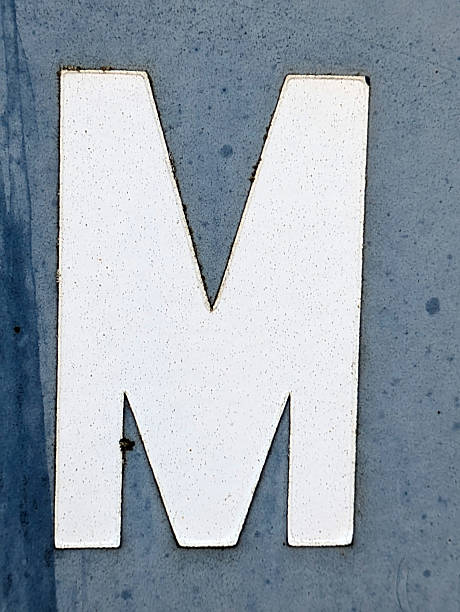 istock Written Wording in Distressed State Typography Advertising Letter M 2197385606