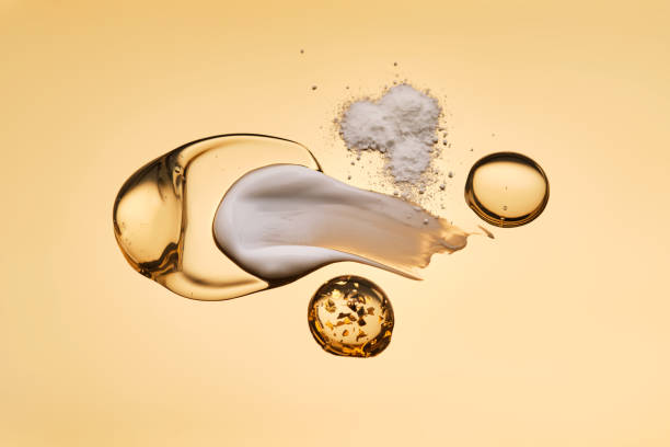 istock Textures of different cosmetic products on a gold background. 2197386309