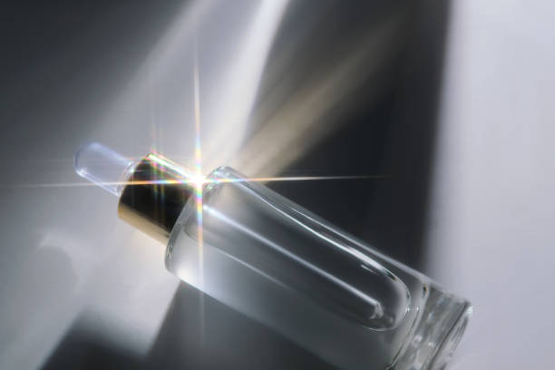 istock Bottle of face serum with a pipette with a beautiful highlight. 2197387503