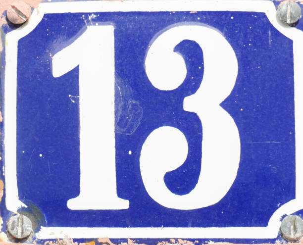 istock Blue house number sign number 13 , Superstition, Germany 2197394348