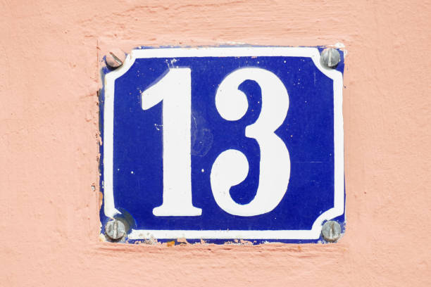 istock Blue house number sign number 13 , Superstition, Germany 2197394360