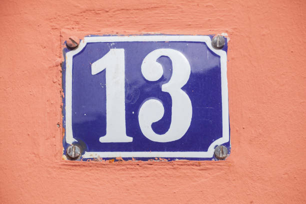 istock Blue house number sign number 13 , Superstition, Germany 2197394568