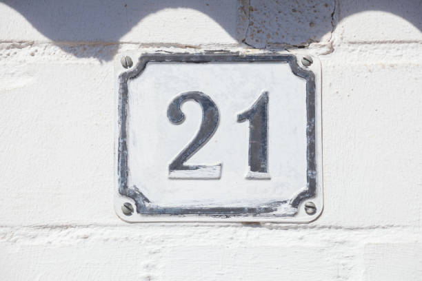 istock White house license plate number 21 on white background, Germany 2197394662