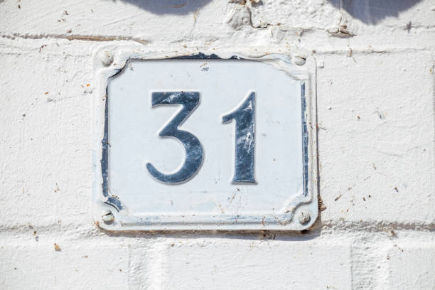 istock White house license plate number 31 on white background, Germany 2197394740