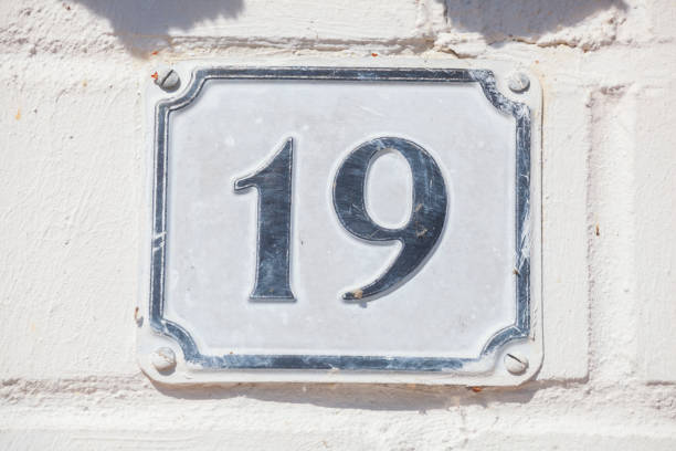 istock White house license plate number 19 on white background, Germany 2197394743