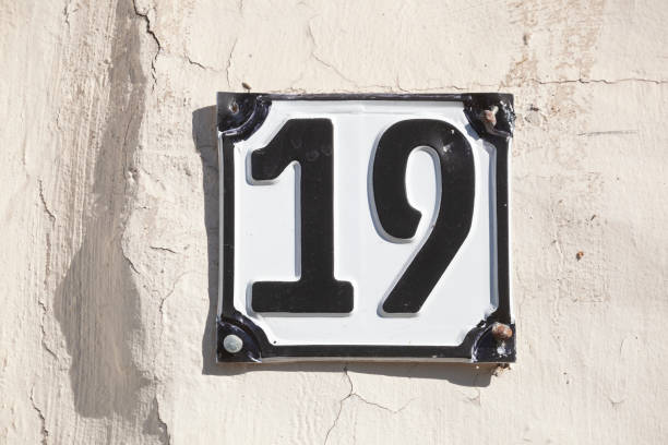 istock White house license plate number 19 on white background, Germany 2197394789