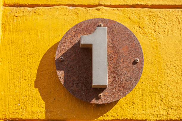 Number 1 white piece on a rustic dark green background