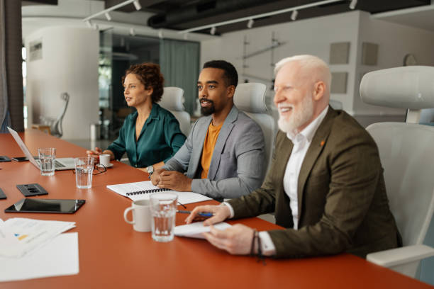 istock Engaged professionals discussing business strategies. 2197404076