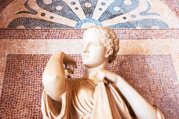 Ancient Mosaic Artwork Featuring a Goddess Figure