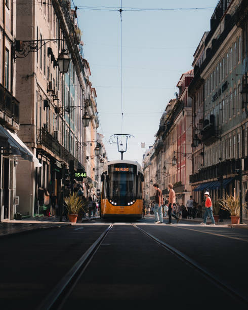istock Yellow Tram on Lisbon’s Historic Streets 2197412542