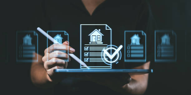 istock Digital house checklist displayed on tablet with stylus interaction in dark background. 2197416142