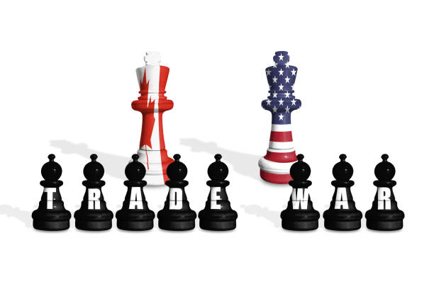 istock Chess made from US and Canada flags on a white background with word TRADE WAR 2197420525
