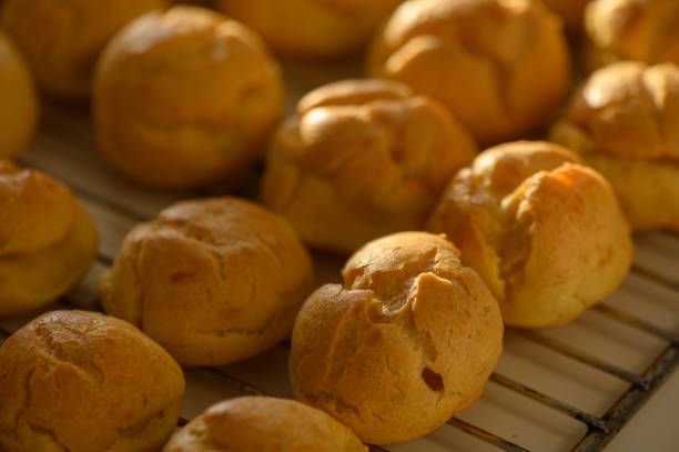 istock Golden pastries cool on a rack in a warm kitchen filled with delightful aromas 2197422198