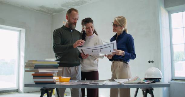 istock The designer discusses the project with the customers 2197424164