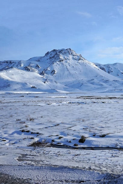 istock Natural landscape of snowy mountain range with cloudy blue sky 2197425249