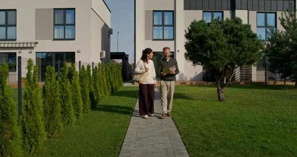 istock A man and a woman are studying a house design project 2197425411
