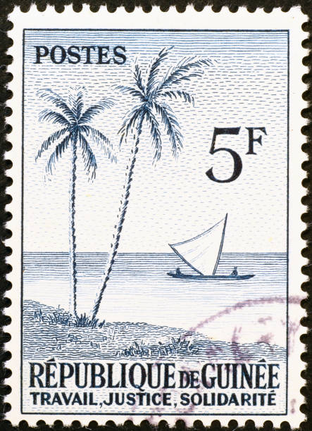 istock Dhow & palms on vintage stamp of Guinea 2197425850