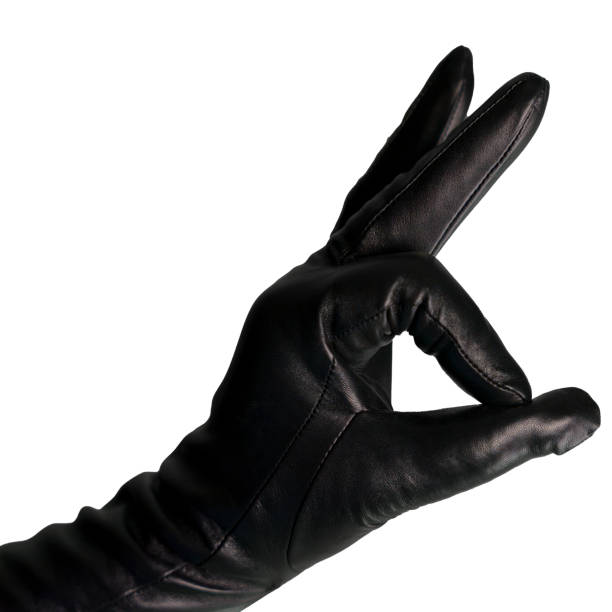 istock Hand in black leather glove making an OK gesture 2197430058