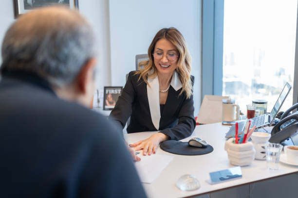 istock Loan Officer Meeting With Senior Customer 2197431565
