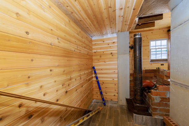 istock Cozy wooden interior with a chimney and construction tools in a rustic cabin setting 2197431648