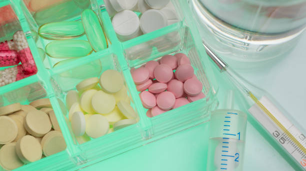 istock medical background with pills 2197432777