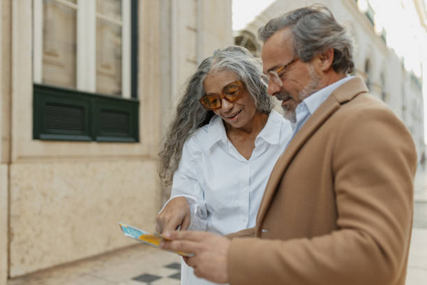 istock Couple Enjoying Moments Together with a Map 2197433390