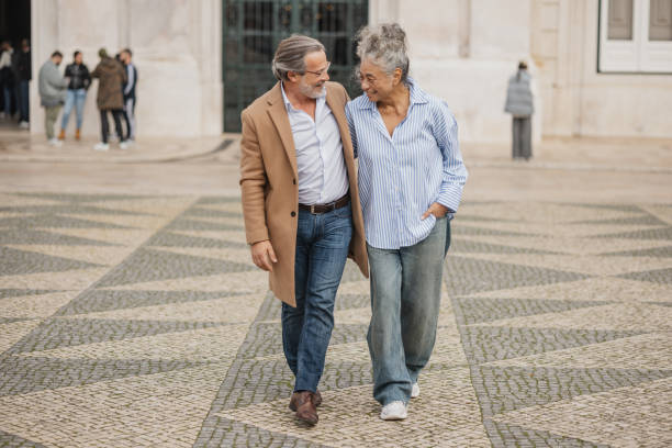 istock Couple Enjoying a Romantic Walk in an Urban Setting 2197434628