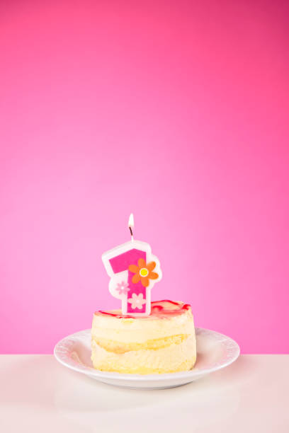 Colorful Celebration Cake with Macarons and Ice Cream Cone Decoration.