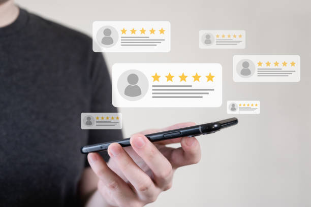 istock Using phone for online customer survey service. Client rate service from experience in application. Consumer gives feedback reviews for business reputation ranking. Customer satisfaction concept. 2197445002