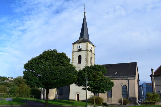 istock village church with green tall trees 2197446066