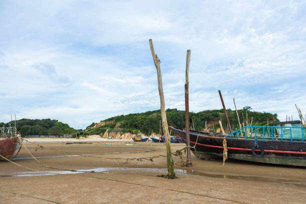 A stranded fishing boat on the beach