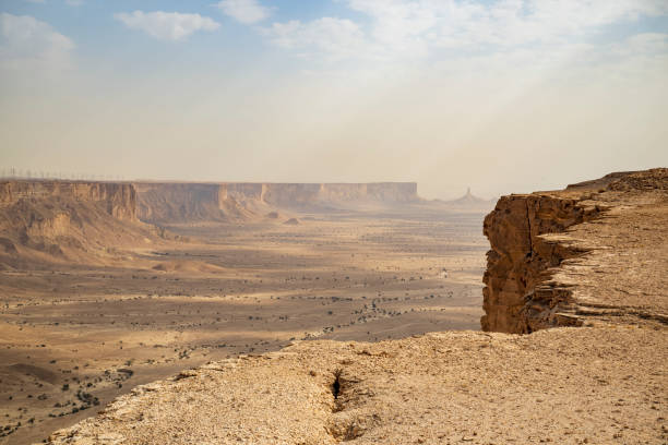 View from atop escarpment that is part of Tuwaiq Mountain range, rising 300 meters above ancient ocean bed now desert plain, 100 km northwest of Riyadh.